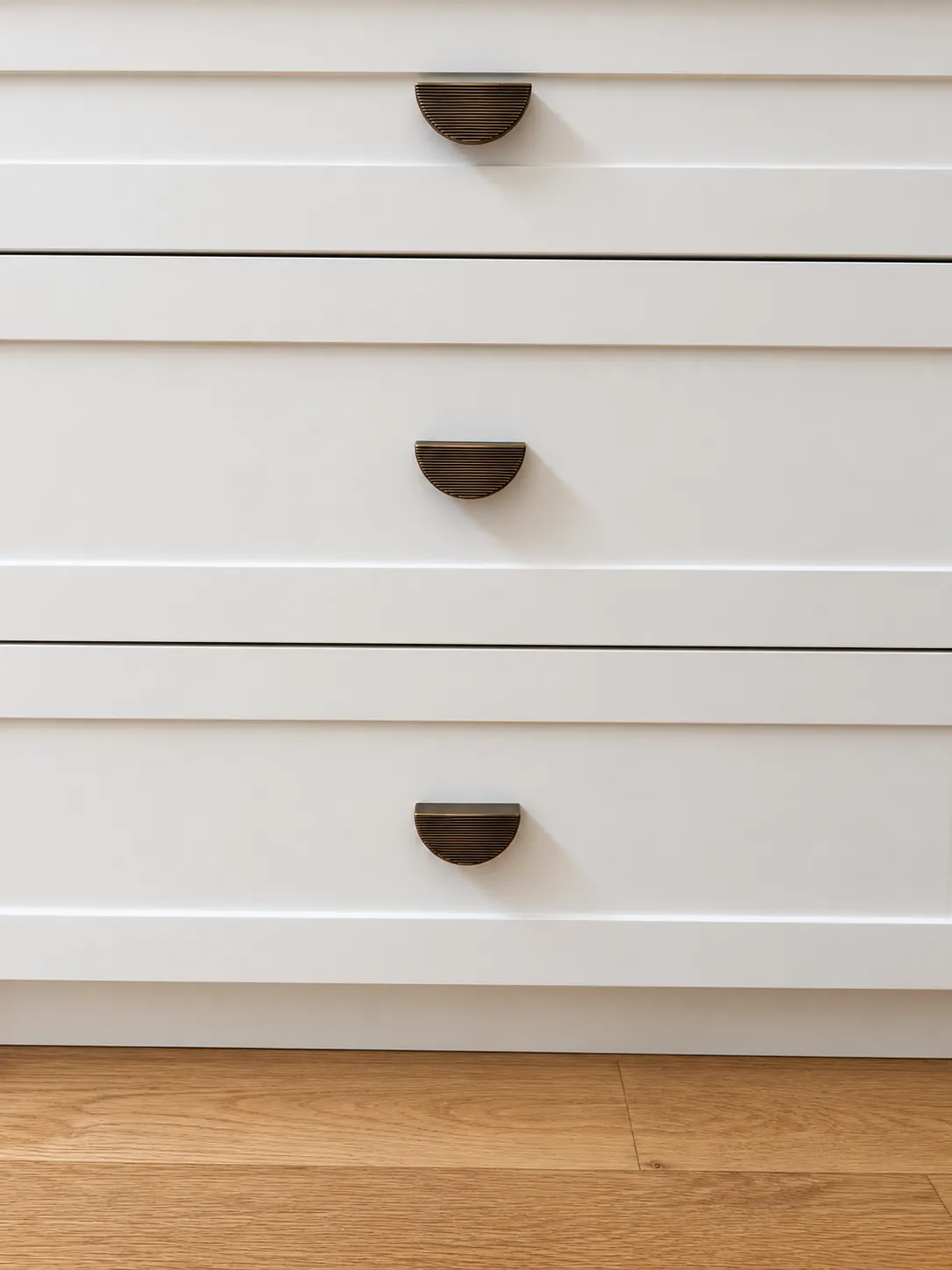 Shaker drawers with half-moon brass pulls